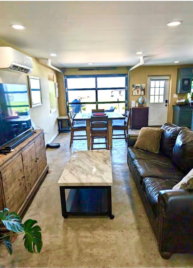 living room with a wall mounted air conditioner