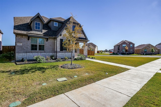 view of front of home with a front yard