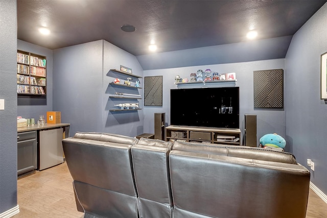 living room with lofted ceiling