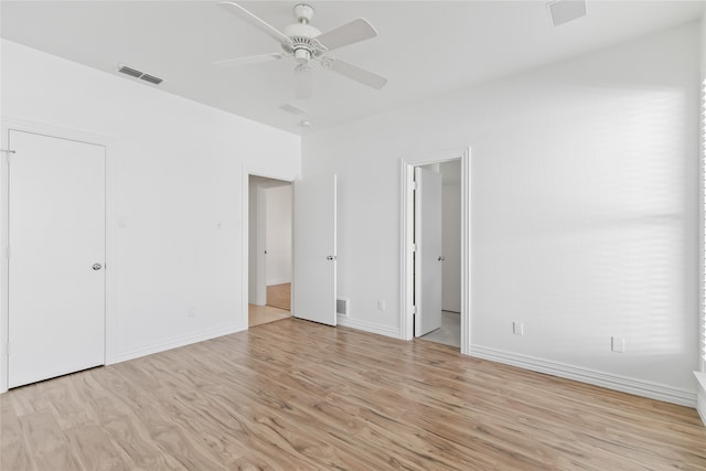 unfurnished bedroom featuring light hardwood / wood-style floors and ceiling fan