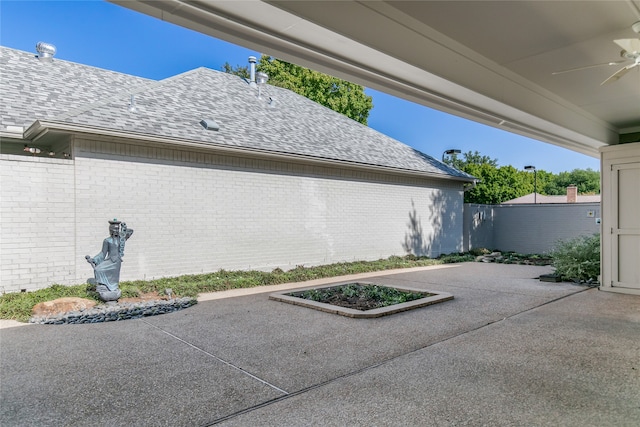 view of patio / terrace featuring ceiling fan