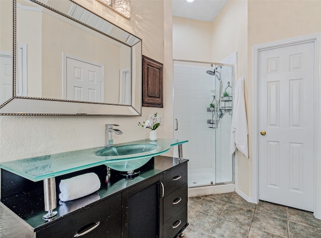 bathroom with vanity and walk in shower