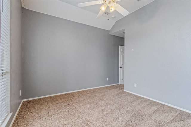 unfurnished room featuring carpet floors, ceiling fan, and lofted ceiling