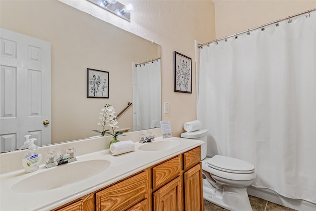 bathroom with tile patterned flooring, vanity, toilet, and curtained shower