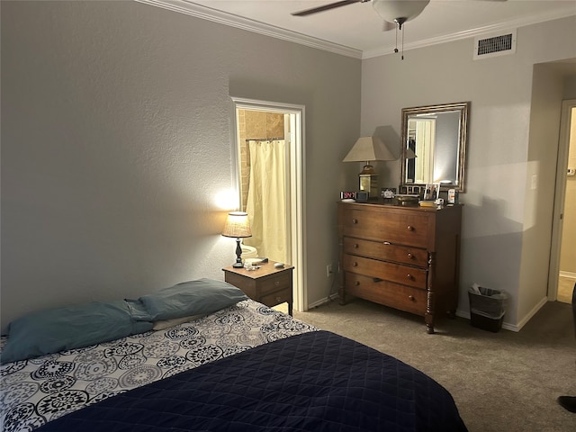 bedroom with ceiling fan, light colored carpet, and ornamental molding