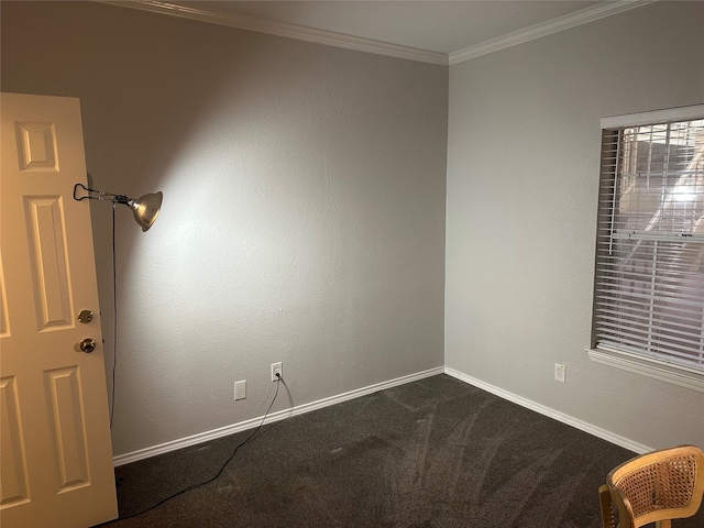 empty room with carpet flooring and crown molding