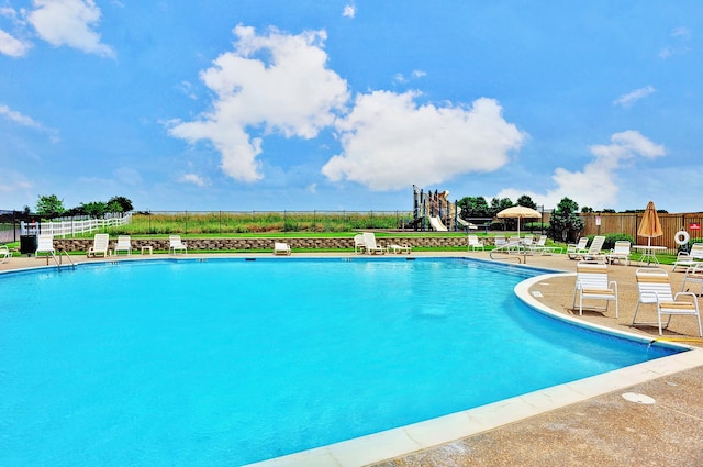 view of pool featuring a patio