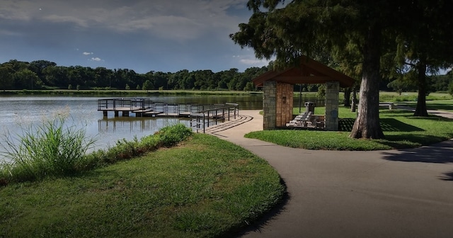 dock area featuring a gazebo and a water view