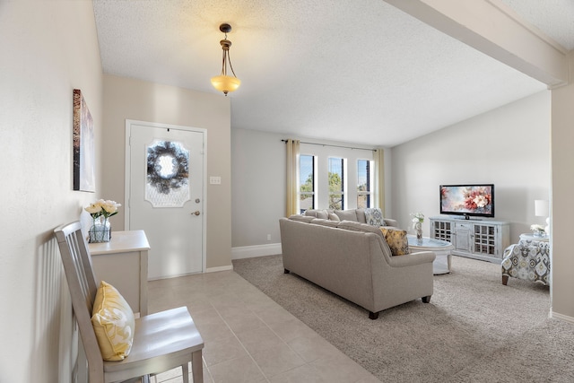 tiled living room with lofted ceiling and a textured ceiling