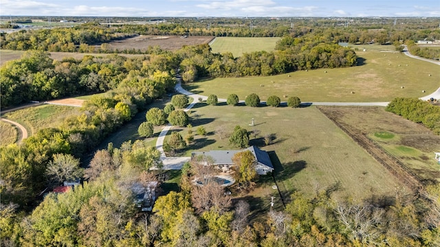 birds eye view of property featuring a rural view