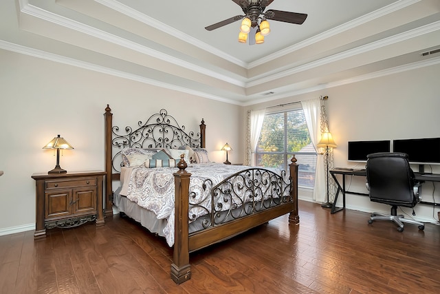 bedroom featuring a raised ceiling, ceiling fan, crown molding, and dark hardwood / wood-style floors