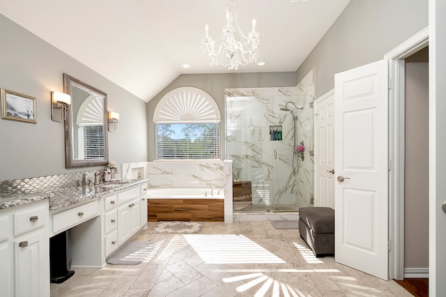 bathroom featuring separate shower and tub, vanity, a chandelier, and lofted ceiling