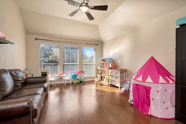 recreation room featuring ceiling fan, hardwood / wood-style floors, and lofted ceiling