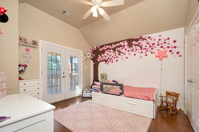 bedroom featuring lofted ceiling, dark wood-type flooring, access to outside, french doors, and ceiling fan