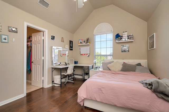 bedroom featuring dark hardwood / wood-style floors, ceiling fan, and lofted ceiling