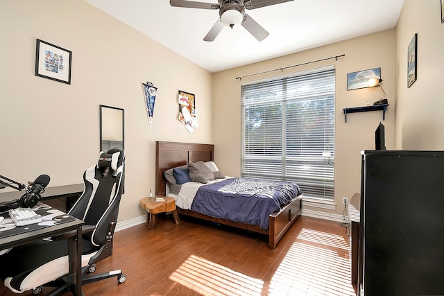 bedroom featuring ceiling fan and wood-type flooring