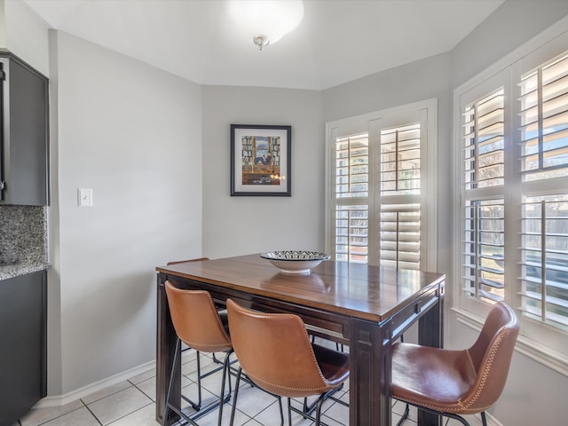 view of tiled dining space