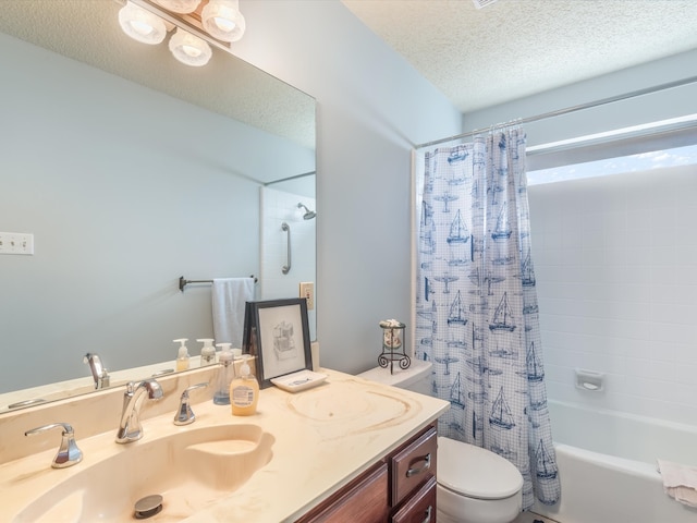 full bathroom with shower / tub combo with curtain, vanity, a textured ceiling, and toilet