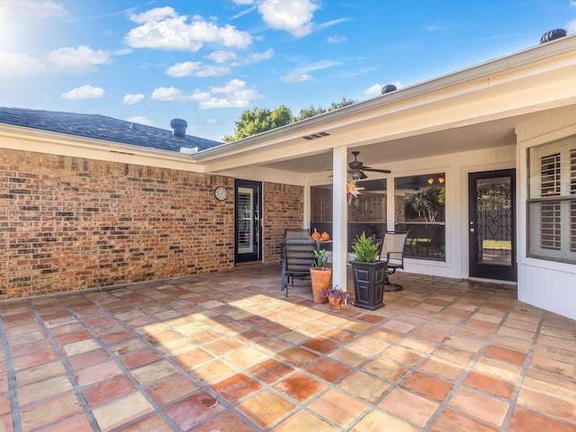 view of patio / terrace featuring ceiling fan