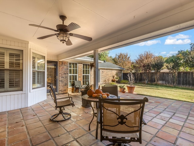 view of patio / terrace featuring ceiling fan