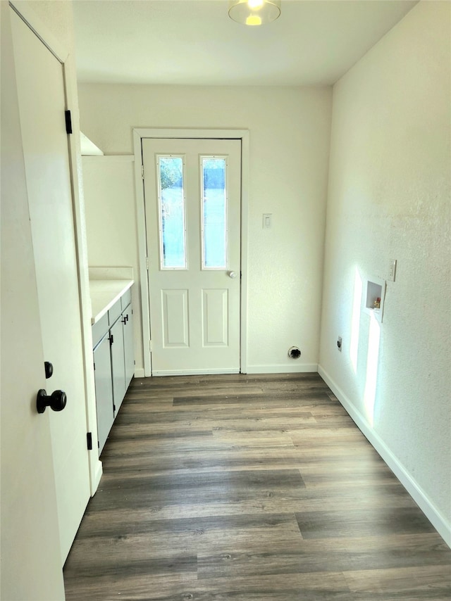 laundry room featuring cabinets, washer hookup, dark hardwood / wood-style flooring, and electric dryer hookup