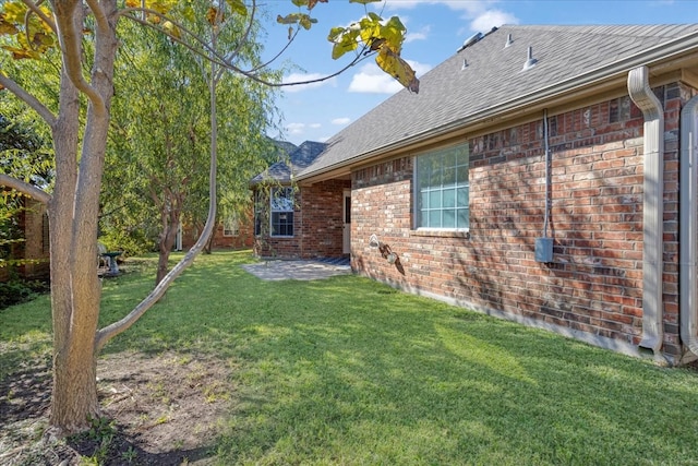 view of yard with a patio area