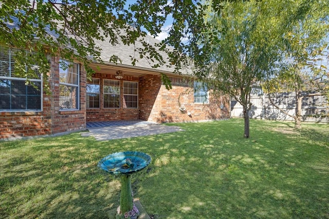 view of yard featuring a patio