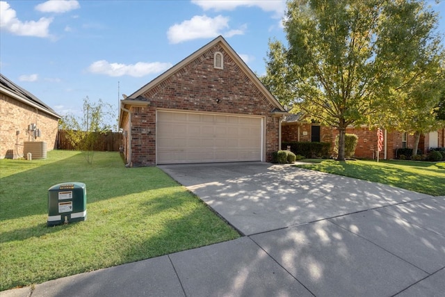 view of property with a front yard and a garage