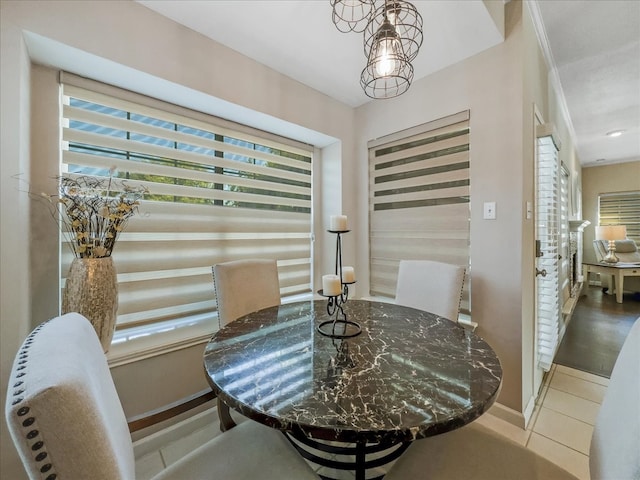 dining room featuring light tile patterned flooring