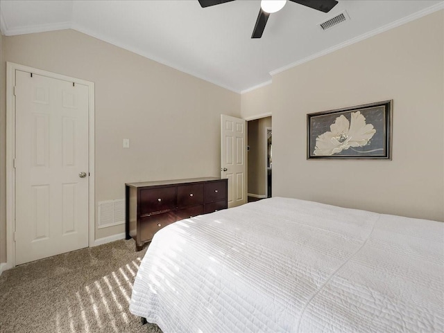 carpeted bedroom with crown molding, ceiling fan, and lofted ceiling