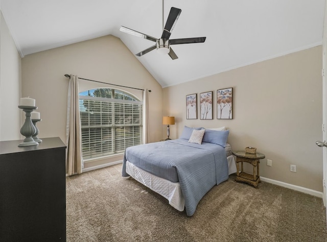 carpeted bedroom with ceiling fan and vaulted ceiling