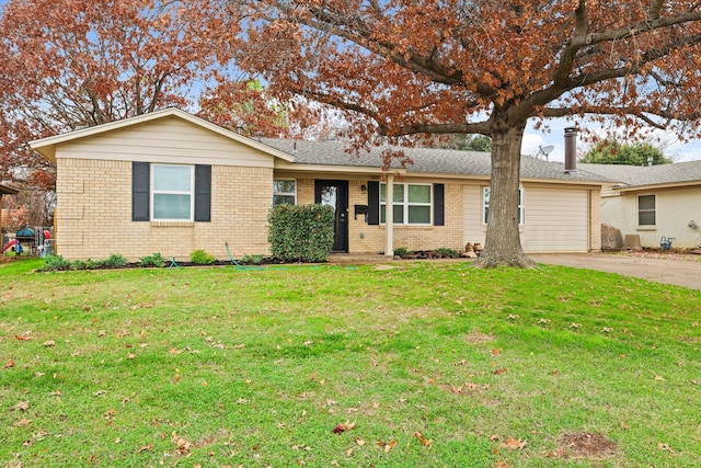 ranch-style house with a front lawn and a garage