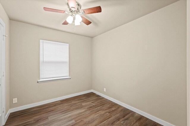 spare room featuring ceiling fan and wood-type flooring