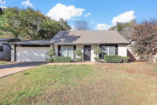 single story home with a front lawn and a garage