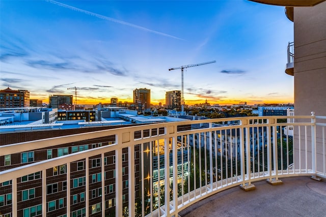 view of balcony at dusk