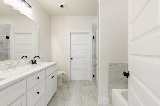 full bathroom featuring vanity, toilet, and independent shower and bath