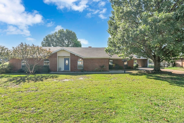 ranch-style home with a front lawn