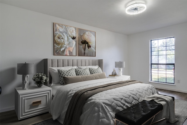 bedroom featuring dark hardwood / wood-style floors