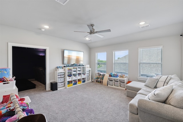 interior space featuring ceiling fan and light colored carpet