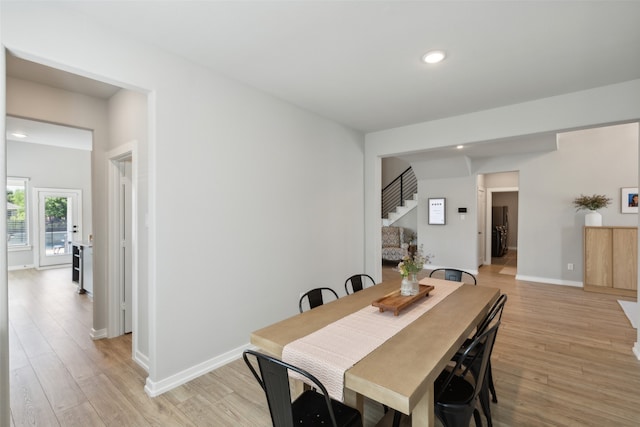 dining room featuring light hardwood / wood-style flooring