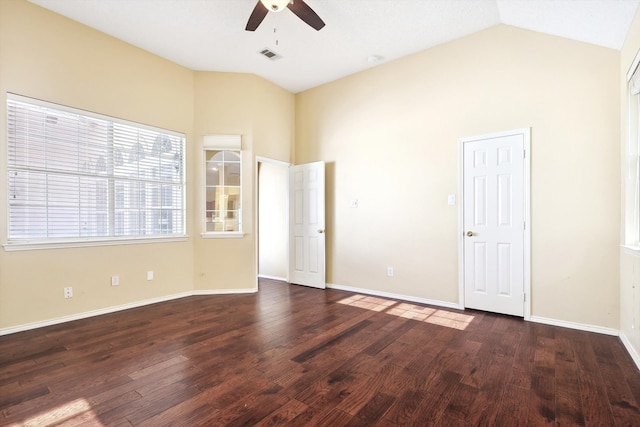 interior space featuring dark hardwood / wood-style floors, ceiling fan, and lofted ceiling