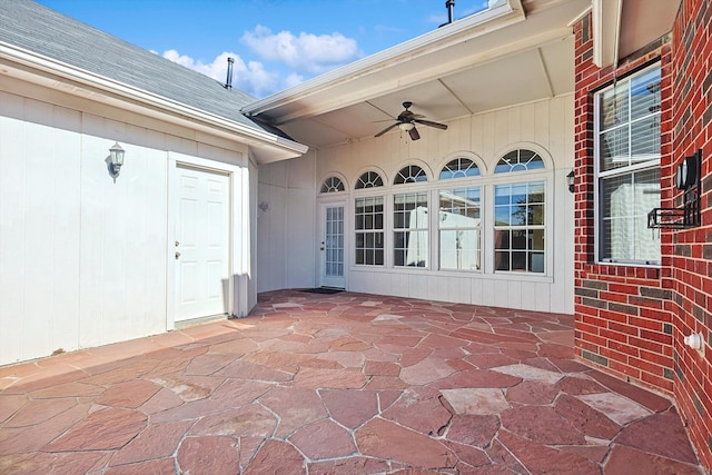 view of patio featuring ceiling fan