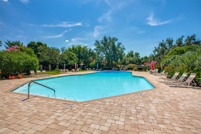 community pool with a patio