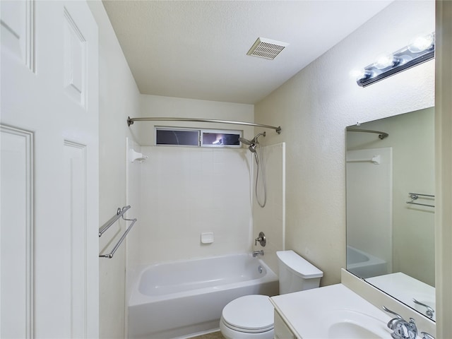 full bathroom with vanity, shower / bathing tub combination, a textured ceiling, and toilet