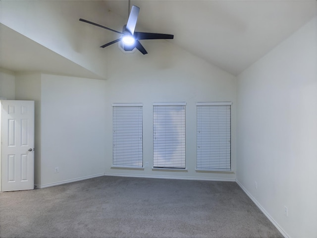 unfurnished room featuring carpet floors, high vaulted ceiling, and ceiling fan