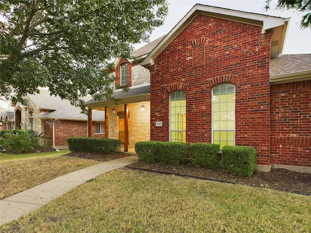 front of property with a front yard