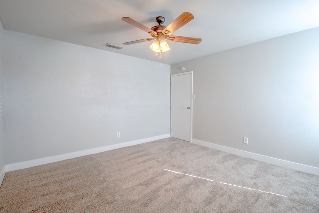 empty room with carpet and ceiling fan