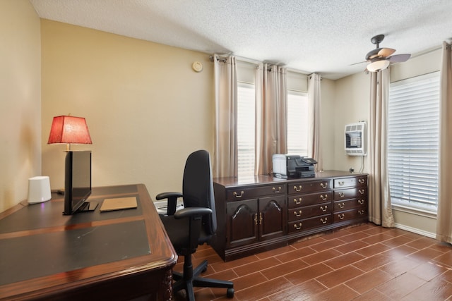 office space featuring dark hardwood / wood-style floors, ceiling fan, a textured ceiling, and heating unit