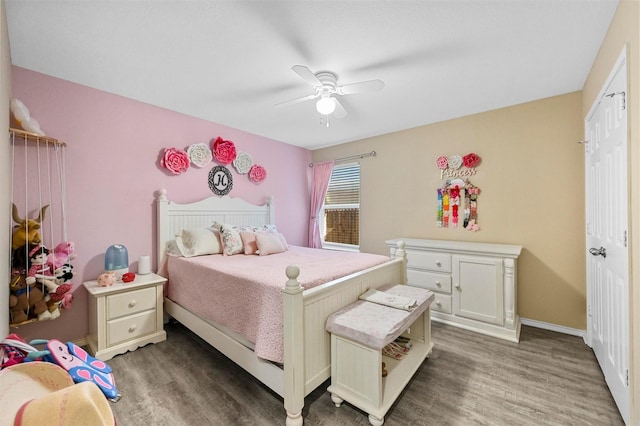 bedroom with hardwood / wood-style floors