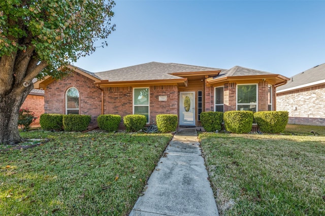 view of front of home with a front yard